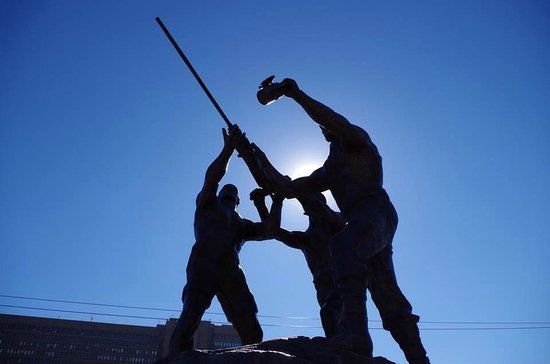 Gold Mining Statue